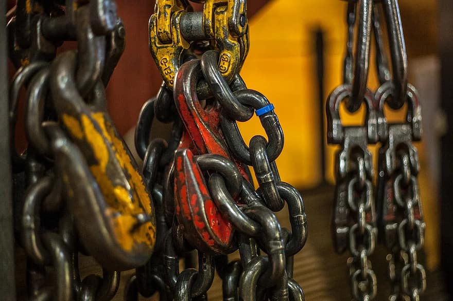 Heavy industrial lifting chains and hooks.