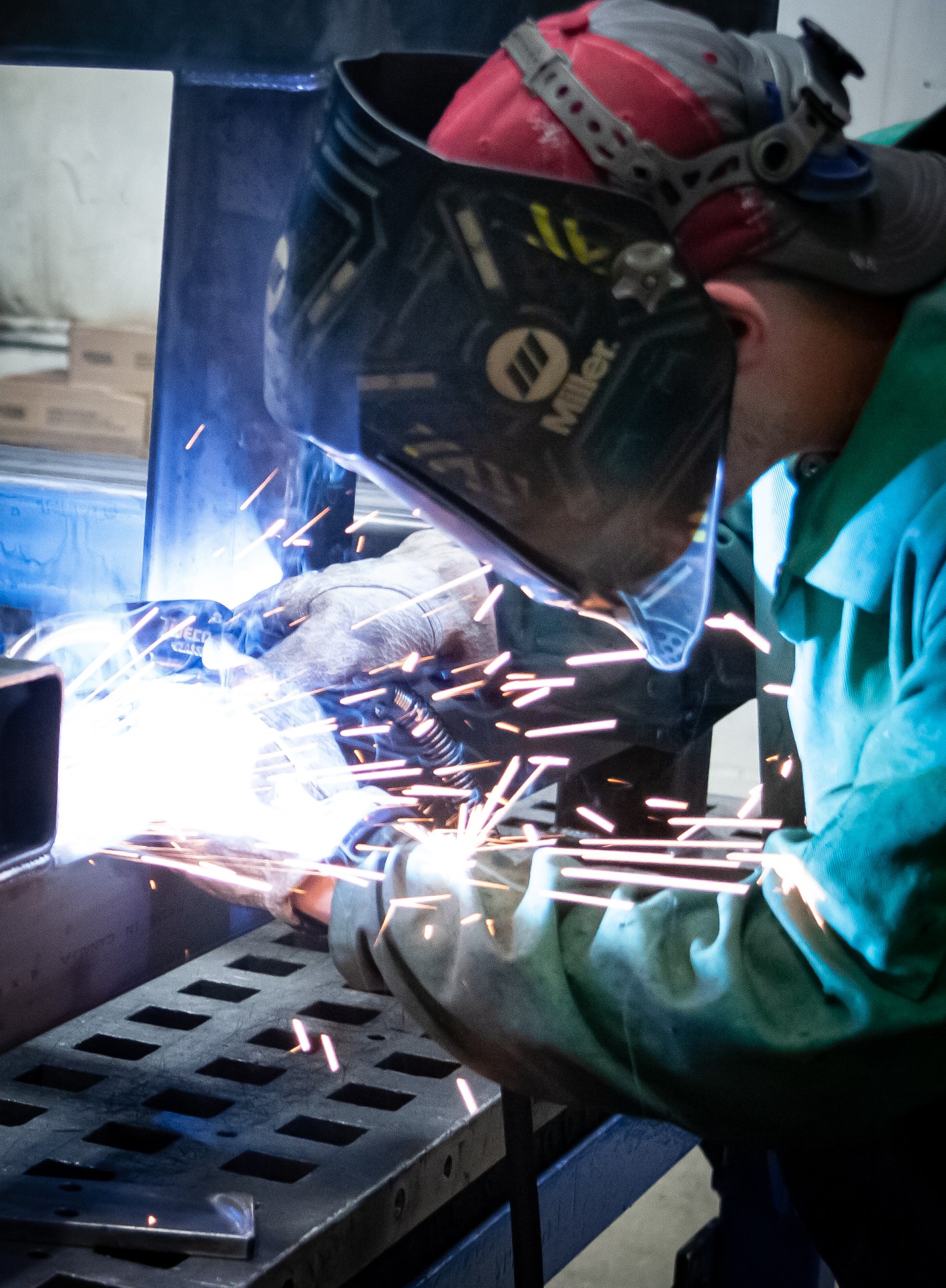 Stainless steel end-of-arm tooling being welded during fabrication.
